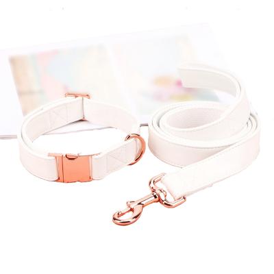 China Custom Logo Metal Buckle Personalized Pu Leather Dog Collars and Leashes Luxury High End Padded For Dog for sale