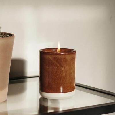 China Hot Sale Eco-friendly Custom Ceramic Candle Holder Christmas Cylinder Home Decoration Logo Brown Ceramic Candle Jars for sale