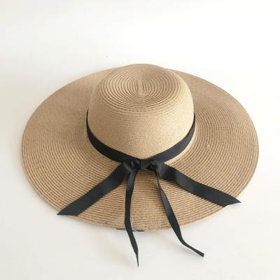 China Wholesale Picture Summer Women Straw Hat Large Brim Beach Straw Hats Ribbon Around Flat Top Sun Hat for sale