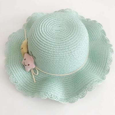 China Hot Selling Image Summer Moving Stars Decorated Wave Edge Children's Paper Straw Hats for sale