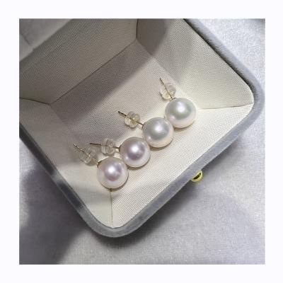 China CLASSIC high gloss round E006 large pearl earrings 10-11 mm S925 factory direct selling silver creative soft women's earrings for sale