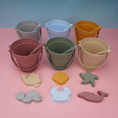 China Funny Portable Kids Toys 33 BPA Free Silicone Sand Bucket Toys Customized Silicone Beach Toys Silicone Bucket And Shovel Sets for sale