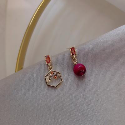 China Romantic Silver Red Bean Asymmetric Small Stud Earrings Simple Short 925 Needle Student Earrings for sale