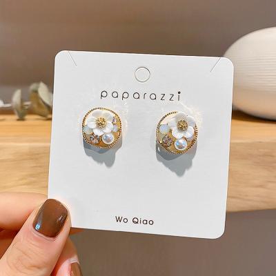 China Korean temperament of flower romantic super fairy earrings around the hollow diamond earrings simple and fresh earrings for sale