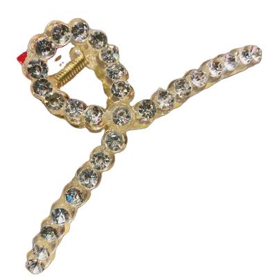 China Classy Korean Style Bling Gold Hair Claw Japan and Korea Blogger Temperament Grab Clip With Colorful AB Rhinestone Shark Clip For Shower Wash Face for sale