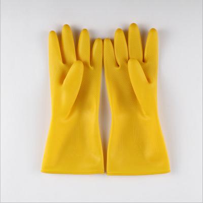 China Universal hot sale wholesale cheapest household yellow wash bombs kitchen glov women household goods latex waterproof cleaning glo VE for sale