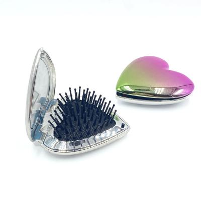 China Waterproof Factory Custom Cute Female Detangle Hair Brush Portable Heart Shape Folding Compact Folding Hair Brush With Mirror for sale