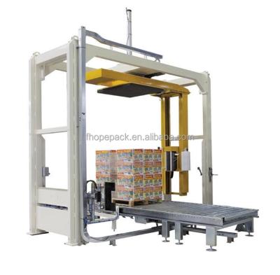 China New Chemical Automatic Arm Stretch Rotary Wrapping Machine For Pallet Wrapping for sale