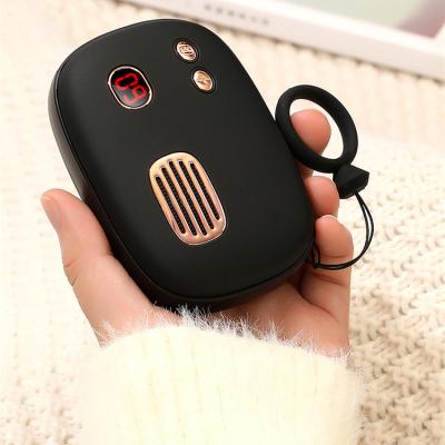 China 2021 Retro Usb Gift Rechargeable Electric Portable Hand Warmer Mobile Power Bank Retro-Q5 for sale