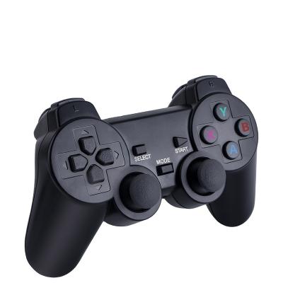 China ABS Family TV 32G unit 10000 games stick wireless controller 2.4G gamepad 4K HD M8 video game console for sale