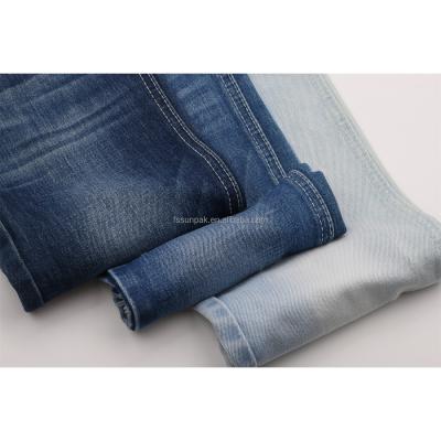 China Good 10oz Indigo Style 2022 New Style Fashion Heavy Dark Blue Wick Spandex Stretch Denim Fabric For Jeans for sale