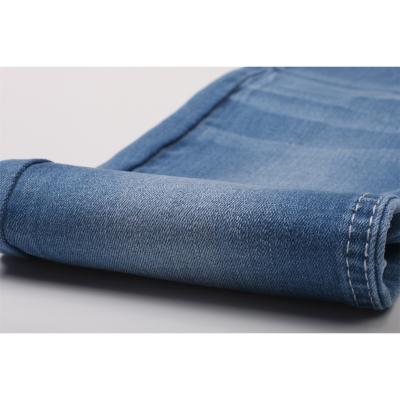 China Breathable Super Stretch 10oz Cotton Poly Spandex Jeans Fabrics High Quality And Cheap Stretch Denim Fabric for sale