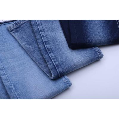 China Direct factory price cheap roving twill stretch jeans fabric width Shrink-Resistant Customized 10oz Cotton Spandex Indigo Jeans for sale