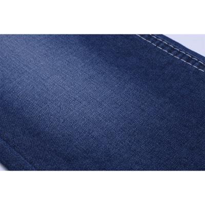 China Best Selling 6oz Indigo Blue Cotton Poly Denim Fabric Light Weight Thin Twill Blue Jeans Fabric Breathable Rigid Denim Fabric For T Shirt for sale