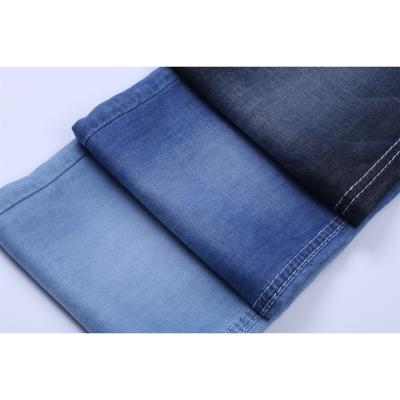 China Low Price Breathable Lightweight Tencel Denim Fabric 100% Good Quality Denim For Skirt Shirt for sale