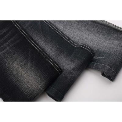 China Cheap High Quality Stretch TR Fabric Cheap Price 9oz Dark Blue Black Midsize Shrink-Resistant Denim Fabric Bulk Soft Feeling Jeans Fabric for sale