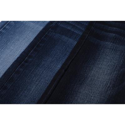 China Wholesale 10 oz poly spandex cotton warp roving stretch denim fabric breathable dark blue jeans fabrics denim manufacturer for sale