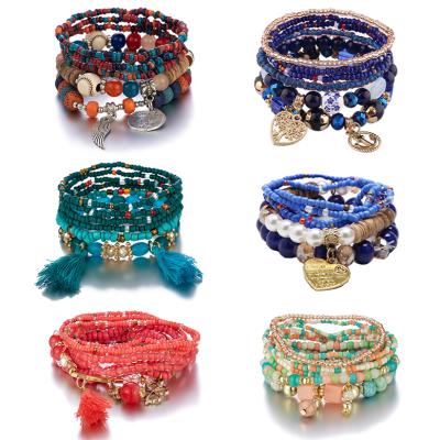 China BOHEMIA Factory Wholesale Unique Boho Stack Ladies Beaded Bracelets Jewelry Woman Cheap Customized Rice Bead Bracelet Sets 2022 for sale