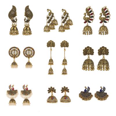 China Hot Sale Ethnic Heavy Gold Peacock Charm Silver Plated Earring For Women Big Statement Indian Jhumka Bell Earrings for sale