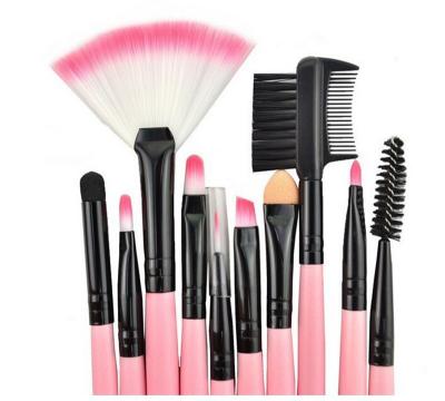 China Soft Pink Handle Smudge Brush Synthetic Eye Stand Makeup Brush Set With Pouch for sale