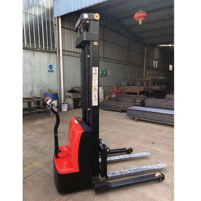 China Building Material Shops Wide Leg Pedestrian Pallet Straddle Drum Lifter Stacker for sale