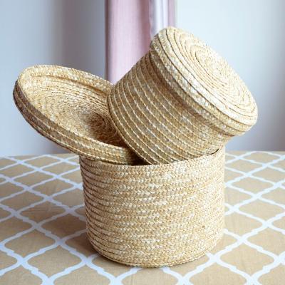 China Straw Wheat Style Straight Hair Plant Storage Cosmetic Basket Traditional Handwoven Pastoral Snack Toys Basket for sale