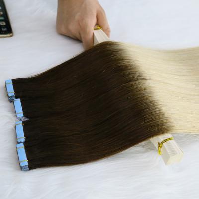 China High Quality Vietnamese Curly Curly Tape Hair Extensions 100% Unprocessed No Tangle No Shedding With Wholesale Price for sale