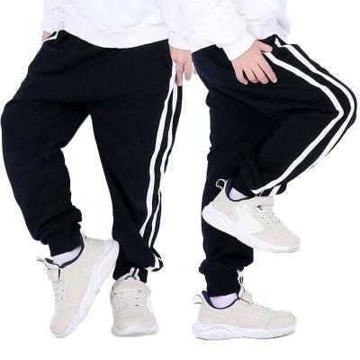 China Anti-wrinkle OEM custom children's sports pants suits fashion 100% cotton casual solid color high quality boy sports pants for sale