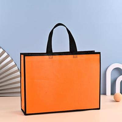 China Recyclable Custom Logo Luxury Laminated Apparel Tote Shopping Bag Non Woven Advertising Gift Nonwoven Bag for sale