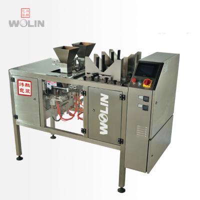 China Mini Doypack Station Open Head Beverage Double Duel Two Fill Seal Machine Open Liquid Pouch Premade Machine Automatic Feed Collection for sale