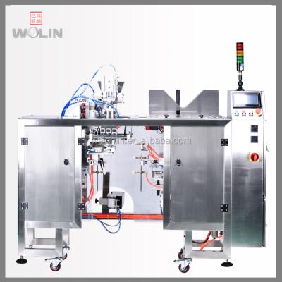 China Fruit Juice Fill Beverage Low Cost Automatic Mini Doypack Packing Machine Line Liquid, Sauce, Shampoo, Seal In Premade Performed Pouches for sale