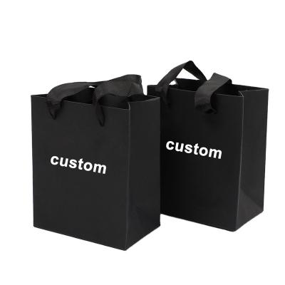 China New Design Recyclable Custom Gift Shopping Kraft Paper Bag Printed Shopping Clothing Paper Kraft Bag With Logo for sale