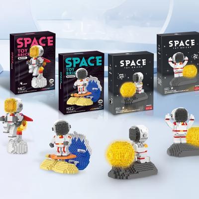 China Micro Eco-friendly Material Building Block Astronaut Space Moon Cartoon Figure With Light City Model Bricks Toys For Children Aerospace Birthday Gift for sale