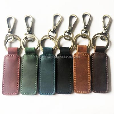 China Custom Couples Car Key Chain Retro Gift Wholesale Environmentally Friendly Creative Handmade Leather Key Chain Gift for sale