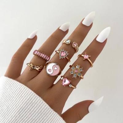 China Environmentally Friendly Fashion Customized Women's Pink Gemstone Ring Sets Flower Letter Heart Ring 8 Pieces Set for sale