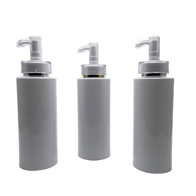 China Packaging Cosmetics Factory wholesale 400ml white PET material cylinder plastic lotion bottle with albion pressing pump for personal care for sale