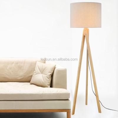 China Natural Colored Wooden Shade 3 Legs Tripod Floor Lamp With Round Canvas Shade for sale