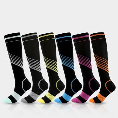 China Hot Selling New Viable Compression Socks Color Stripe Pressure Socks Elastic Sports Socks For Men And Women for sale