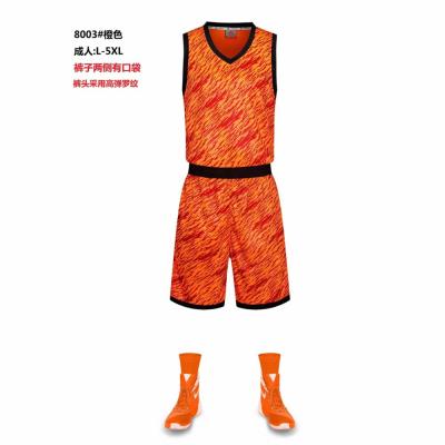 China Antibacterial Orange Basketball Uniform Fashionable Mesh Design With V-Neckline Basketball Tank Tops for sale