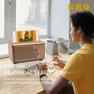 Китай KBQ-1808 new wireless speaker wooden card player FM radio audio продается