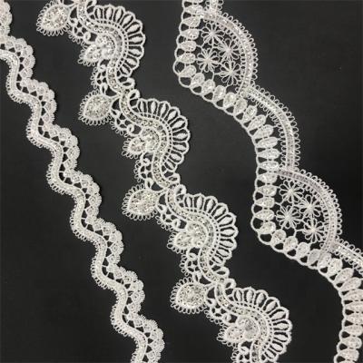 China Newest 4cm polyester water soluble sequin lace crochet trim factory backing lace chemical trim for sale