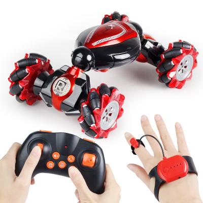 China Carro De Juguete Automatic Remote Control Toy 3 Colors Back Gesture Feeling Rc Stunt Car 360 Rotation Remote Control Car for sale