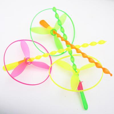 China Toy Outdoor Play Spinning Dragonfly Hand Push Flying Saucer Kid Inflatable Toy for sale