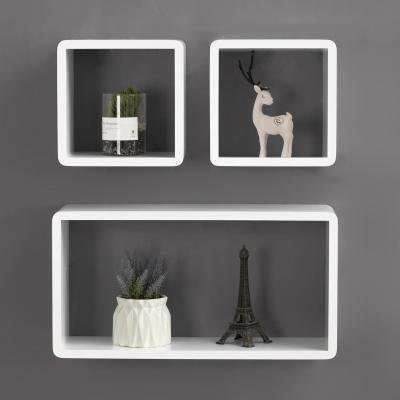 China Creative Storage Home Wall Mounted Shelf Design Photo Storage Rack Living Room Bedroom Wall Rack Shelf for sale