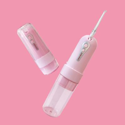 China ABS+PC Mini Portable Folding Travel Water Flosser Select Different Irrigator Dental Oral Hygiene Pink For Lady for sale