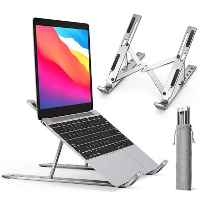 China Portable Foldable Laptop Riser Phone Book Holder ABS Notebook Holder Adjustable Computer Holder Multi-angle Foldable Stand for sale