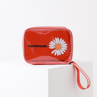 China Fashion Small Daisy PVC Zippered Toiletry Bag Carry Pouch Portable Travel Makeup Waterproof Cosmetic Bags for sale