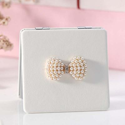 China ABS Handheld Square Mini Arc-knot Personalized Mini Pocket Makeup Mirror for sale