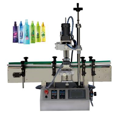 China Food desktop automatic screw capping machine applies perfume bottle capping. for sale