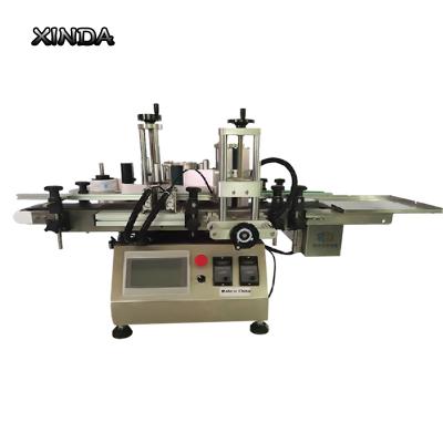 China Food Manufacturers Supply Self Adhesive Desktop Labeling Machine for Round Bottle Labeling for sale